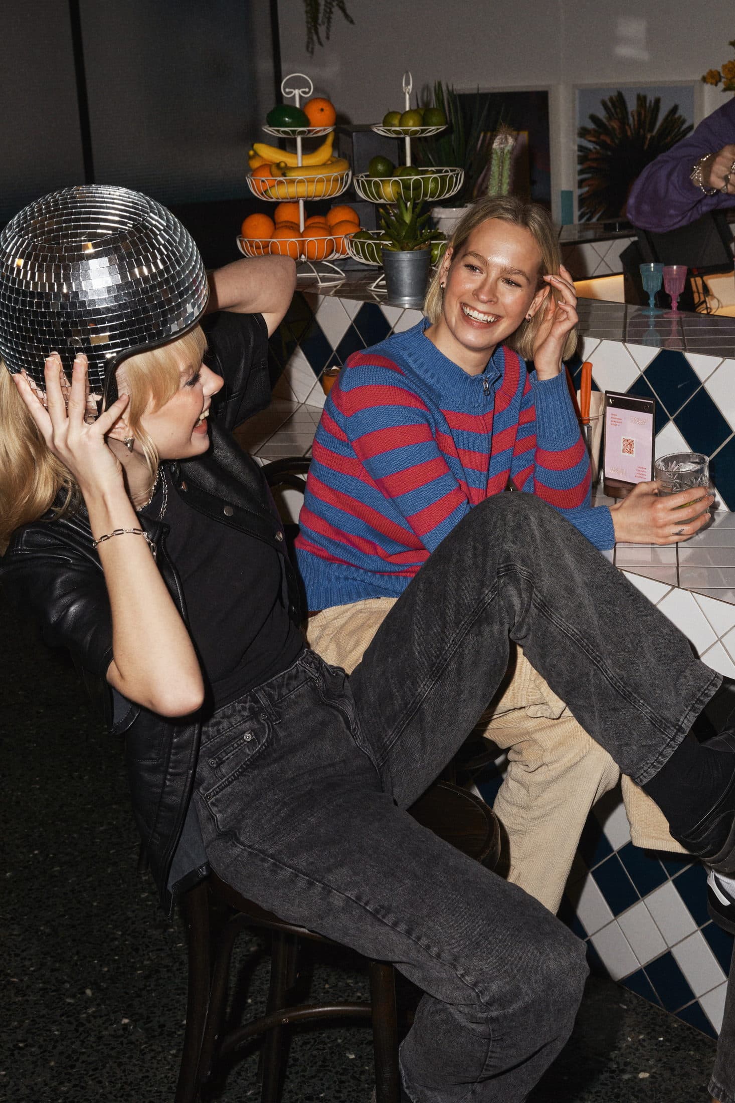 Guests partying under a disco ball